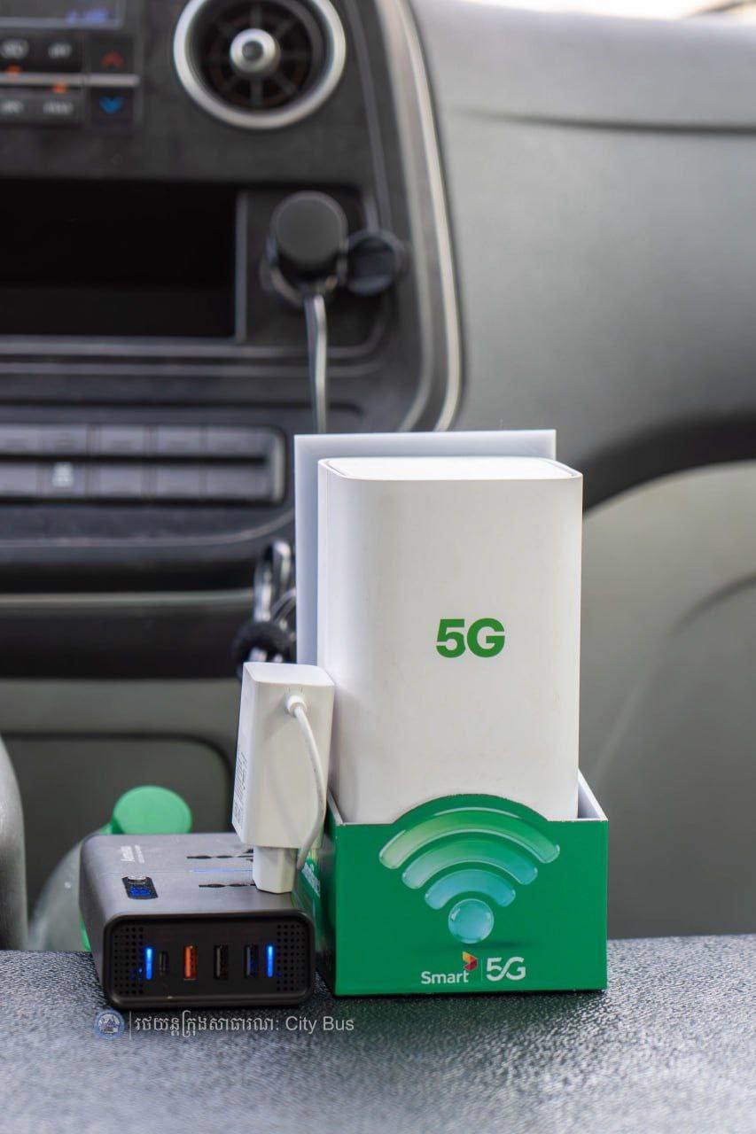 កាន់តែងាយស្រួល កាន់តែមានផាសុកភាព ជិះរថយន្ដក្រុងសាធារណៈ (City Bus) រាជធានីភ្នំពេញ ទៅកាន់អាកាសយានដ្ឋានអន្ដរជាតិតេជោ-Airport Express Bus មានតម្លៃធូរថ្លៃ មានផាសុកភាព មានសុវត្ថិភាព និងឥឡូវនេះអាចប្រើប្រាស់សេវាអុីនធឺណិត(Free WiFi) ដោយឥតគិតថ្លៃថែមទៀត នៅតាមរថយន្តក្រុងសាធារណៈ និងចំណតរង់ចាំរថយន្តក្រុងសាធារណៈរបស់ខ្សែរត់ទៅកាន់អាកាសយានដ្ឋានអន្ដរជាតិតេជោ-Airport Express Bus។
សូមអរគុណ ក្រុមស្មាត(Smart Axiata) ដែលបានសហការ និងឧបត្ថម្ភការបំពាក់អុីនធឺណិតឥតគិតថ្លៃ(Free WiFi) ខ្សែរត់រថយន្ដក្រុងសាធារណ:អាកាសយានដ្ឋានអន្ដរជាតិតេជោ-Airport Express Bus ។
សូមចូលរួមធ្វើដំណើរតាមរថយន្តក្រុងសាធារណៈ (City Bus) រាជធានីភ្នំពេញ ដើម្បី៖
-កាត់បន្ថយគ្រោះថា្នក់ចរាចរណ៍ ការកកស្ទះចរាចរ
-សន្សំសំចៃថវិកា និង
-កាត់បន្ថយការបំពុលបរិស្ថាន
សូមគាំទ្រសេវារថយន្តក្រុងសាធារណៈ(City Bus) រាជធានីភ្នំពេញ!
រថយន្តក្រុង រថយន្តរបស់ខ្ញុំ!
City Bus My Bus! - image 4